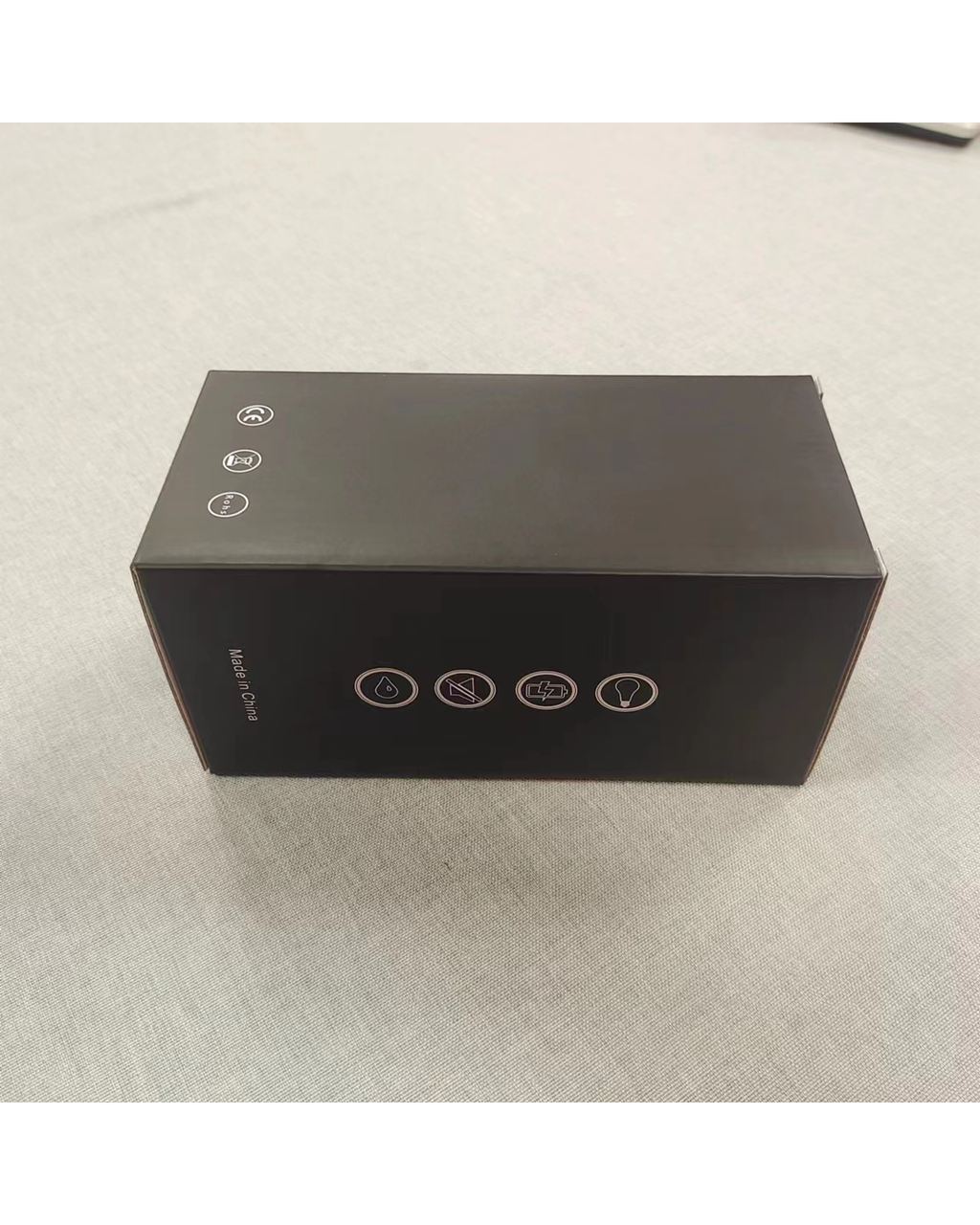 Discreet packaging box for the Bloom-Suck green male masturbator