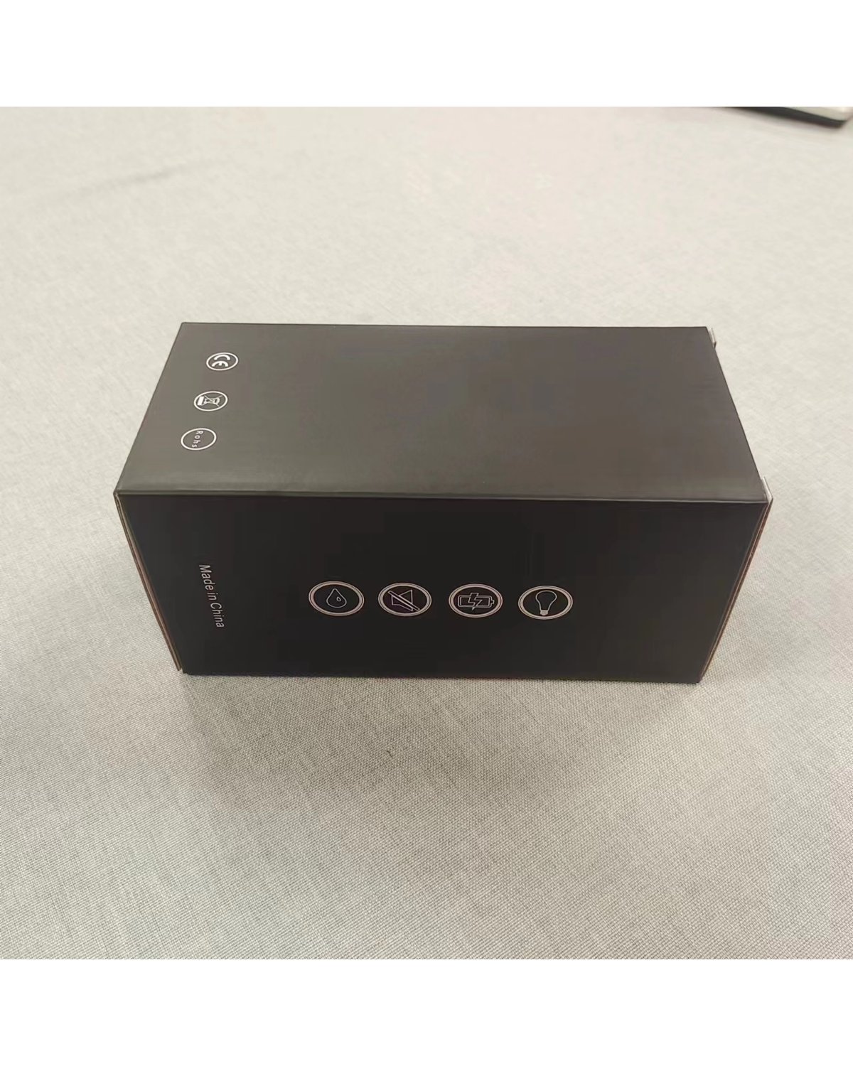 Discreet packaging box for the Bloom-Suck green male masturbator